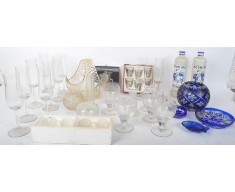 A box of assorted 20th Century glassware. Including twelve champagne flutes, Buckingham Palace glass tumbler, tile, wine glas