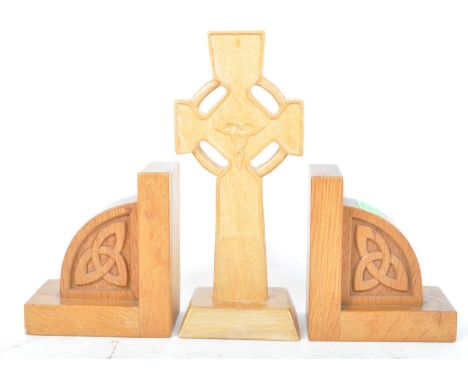 A vintage 20th century wooden Celtic wooden book ends together with a Manx crucifix upon plinth base. Measures 24cm tall.