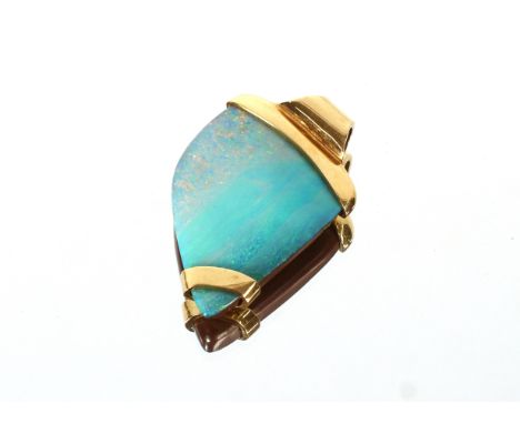 A yellow metal and mounted opal pendant, 22.5gms total weight from Steenson, Belfast