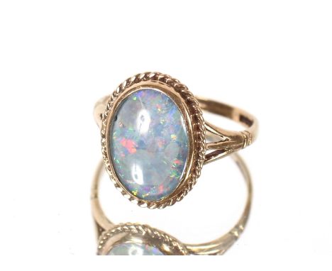 A 9ct gold and opal triplet ring, approx. 3gms total weight, ring size R/S