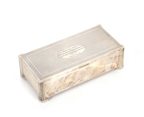 A silver presentation cigarette box, the engine turned lid inscribed "RAC Rally Hastings 1937, Wakefield Trophy", Hallmarked 