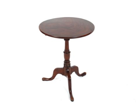 A 19th Century circular mahogany topped occasional table raised on turned baluster column and tripod base, 52cm diameter