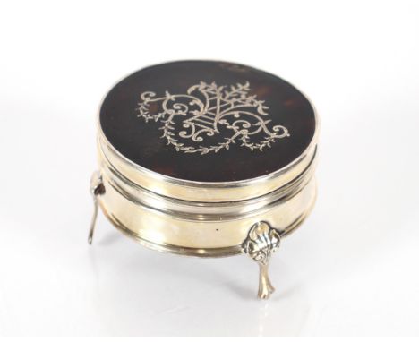 An Edwardian circular silver and tortoiseshell ring box, by William Hutton Birmingham 1909, 6cm dia.&nbsp;