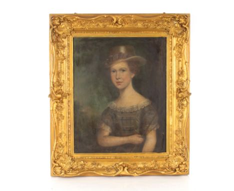 A late 18th Century half portrait of a young lady in fashionable attire, 74cm x 86cm overall, framed&nbsp;
