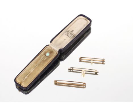 A 9ct gold bar brooch approx. 2.5gms; a white metal and pearl set bar brooch marked 9C approx. 2gms; a yellow metal and white