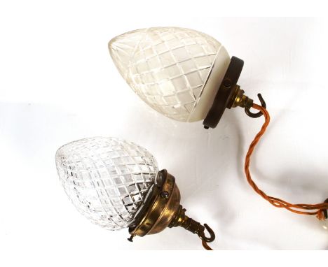 A gilt metal hanging pendant light, with lozenge cut shade, 22cm high; together with another similar with frosted lozenge cut