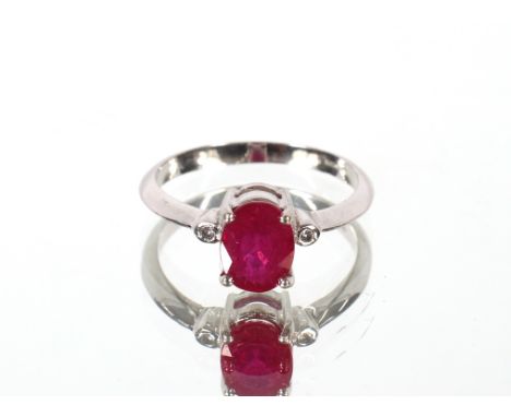 An 18ct gold white gold ruby and diamond set ring, ring size N. Approx. 3.5g