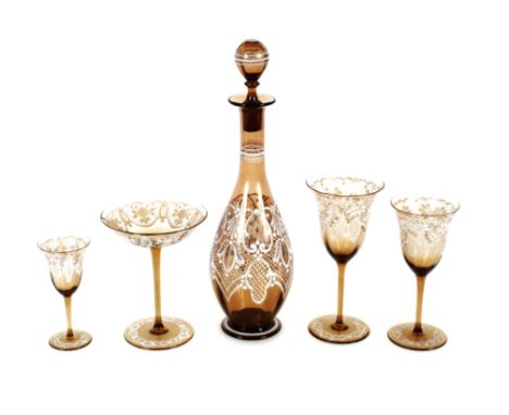 A suite of vintage Murano amber tinted and white enamel lace patterned glassware comprising champagne saucers, wines and a de