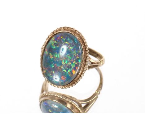 A 9ct gold and opal triplet ring approx. 4.5gms total weight, ring size Q
