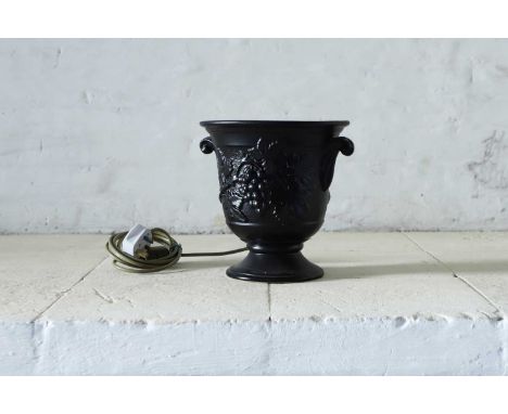 A Holkham Pottery table lamp, mid to late 20th century, with moulded fruiting vine decoration, impressed mark 'Holkham, Engla