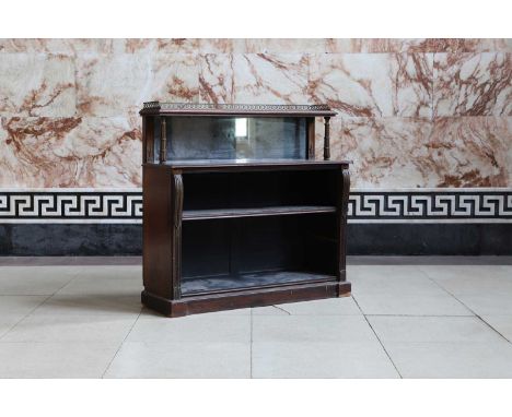 A William IV rosewood cabinet, c.1830, with a pierced brass three-quarter gallery raised on a shelf, mounted with a mirror ba