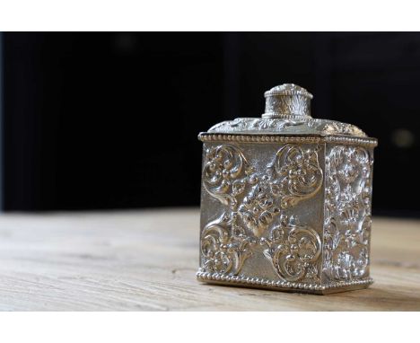 A silver tea caddy, 19th century, Dutch, with chased decoration depicting vases and a foliate motif, on a matted ground with 