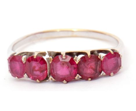 Precious metal five stone ruby ring featuring 5 graduated cushion cut rubies, finger size R (a/f)