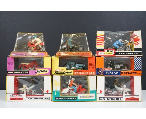 Nine boxed Britains model motorcycles to include 2 x US Sheriff 9692, Harley Davidson 9689, BMW 9694, Honda Benly 9693, Drag 