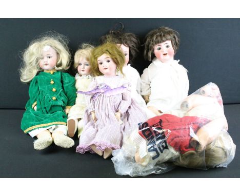 Five early 20th century bisque headed dolls, clothed, with sleeping eyes, composition limbs &amp; painted facial features, wi