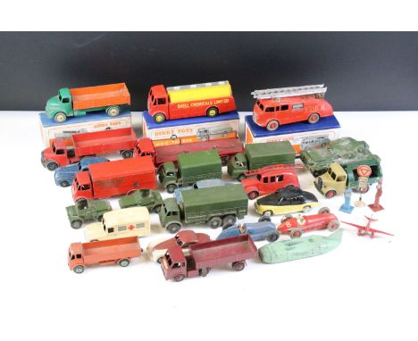 22 Mid 20th C play worn Dinky diecast models to include Foden, Slumberland Guy, Daimler etc, some repainting, plus three boxe
