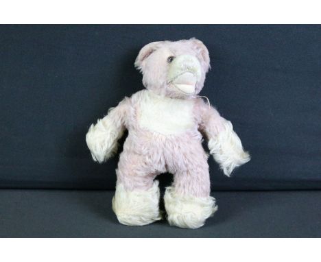 Early-to-mid 20th C Steiff mohair teddy bear, with mouth agape, in pink &amp; cream, button to ear, approx 19cm tall 