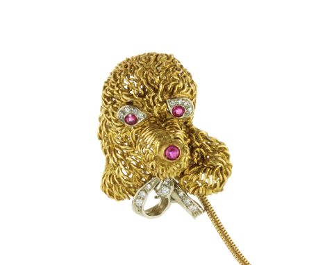 A RUBY AND DIAMOND DOG BROOCH, CIRCA 1980 designed to depict a toy poodle caricature, with ruby and diamond eyes and nose, an
