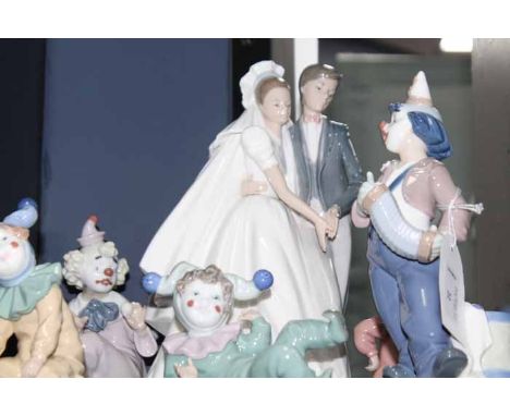 LOT OF NAO FIGURES MODELLED AS CLOWNS 
including a large figure of a bride and a groom