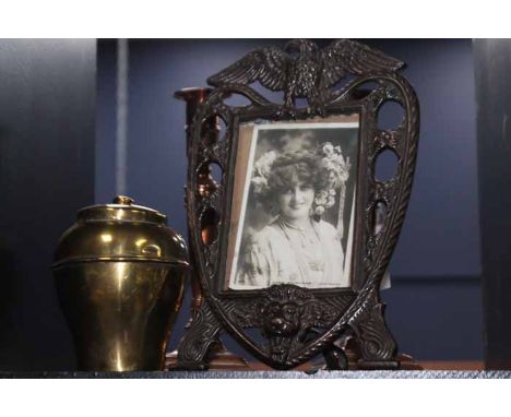 PAIR OF COPPER CANDLESTICKS
a brass British Empire exhibition tea caddy & a cast iron photograph frame