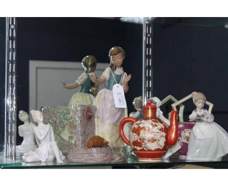 LOT OF NAO FIGURES
including three figures of a girl; together with a Japanese kutani coffee pot and a 19th century Staffords