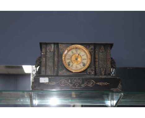EARLY 20TH CENTURY BLACK MANTEL CLOCK
made of black painted metal in the manner of a French black slate mantel clock, bracket