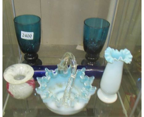 A Bristol blue glass rolling pin and other glass ware.