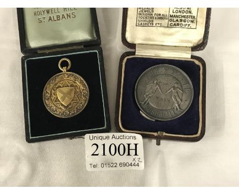 A cased silver gilt seed merchant medal 1909 and a rare Daily Mail Push Ball medal Lincoln 1930 awarded to May Taylor