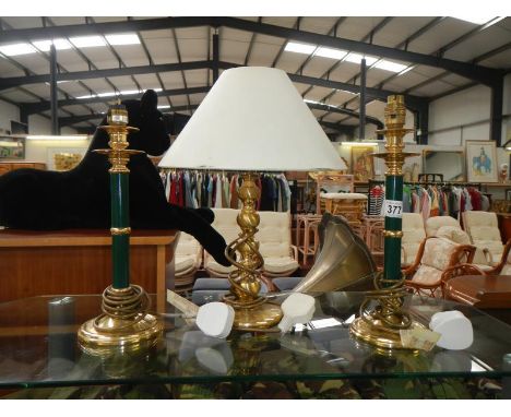 A pair of candlestick style table lamps and 1 other