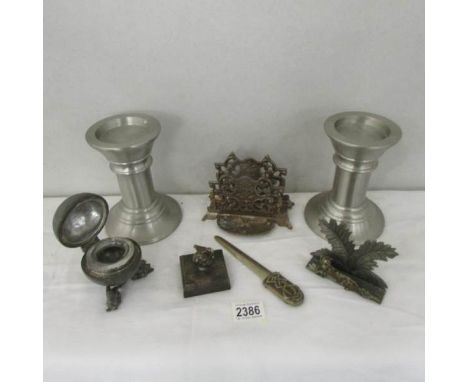 A mixed lot including candle holders, letter racks, inkwell etc.,