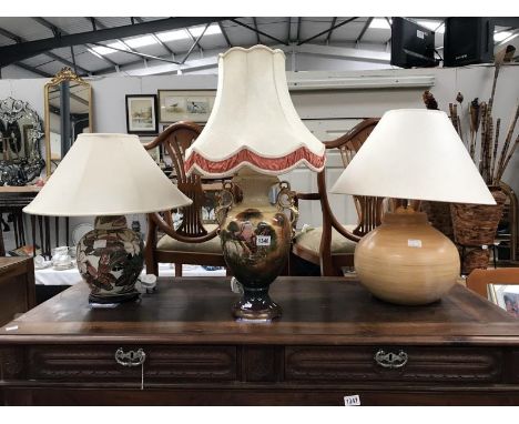 A Victorian vase converted to a table lamp art pottery table lamp and an overlaid pottery floral table