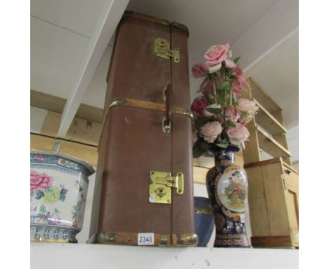 A large vintage travel trunk.