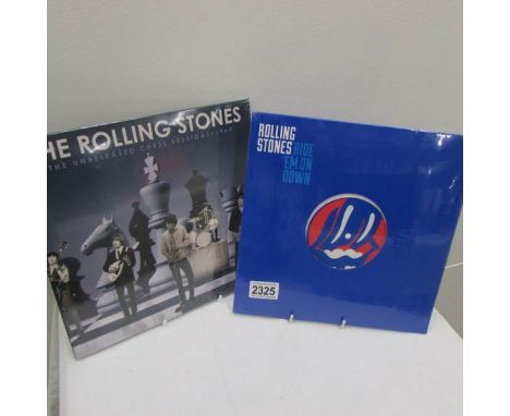 2 Rolling Stones records in original packaging.