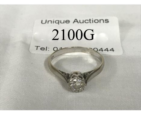 An 18ct white gold solitaire diamond ring