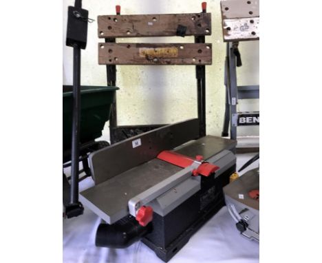 An SIP 6" bench planer with a workmate
