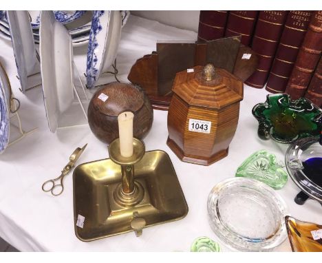 A brass chamber stick with wick trimmer, oak desk picture frame and 2 wooden jars