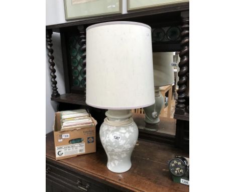 A table lamp with oriental leaf design