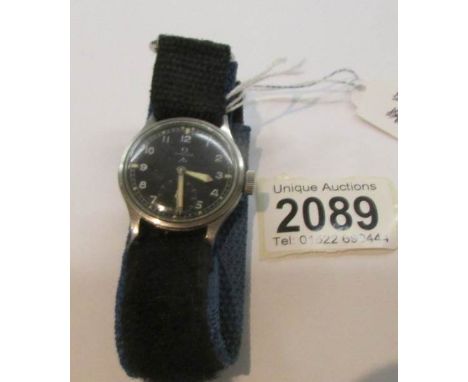 An Omega military issue stainless steel wrist watch with circular black dial and war department arrow, Arabic numerals, minut