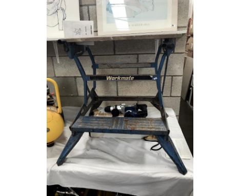 A Ferm FBH-620 SDS rotary hammer drill and a workmate