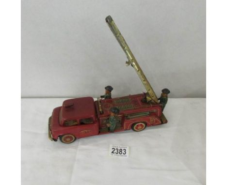 A tin plate fire engine.
