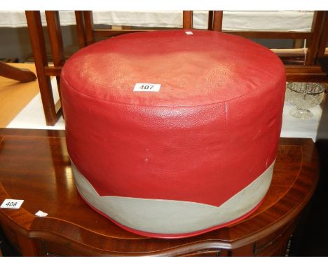 A vintage Sherborne foot stool pouffe