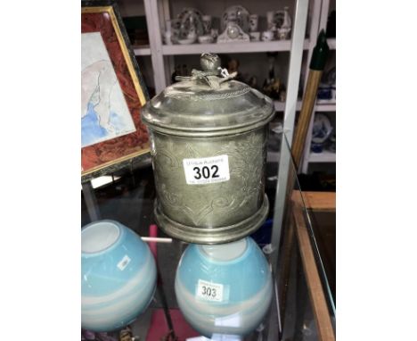 A pewter tea caddy