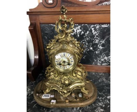 An ornate French style mantle clock