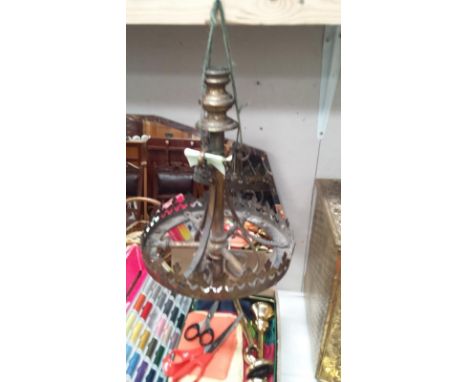 An old brass hanging lamp base