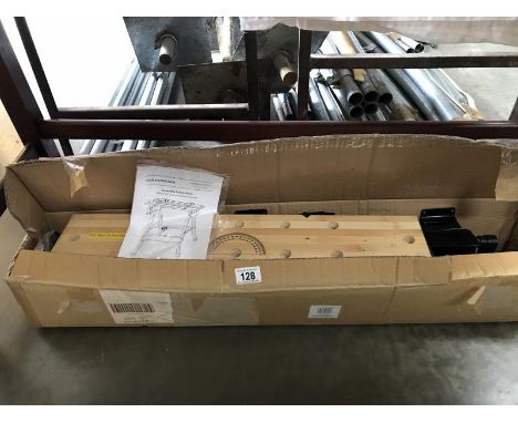 An unassembled folding work bench