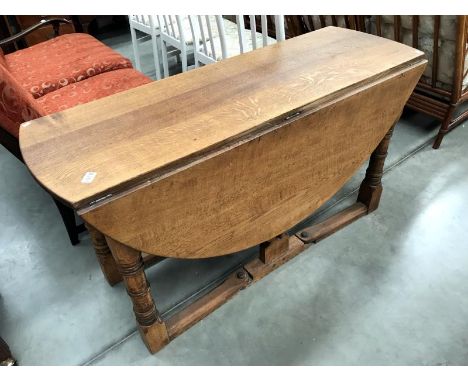 An oak gate leg table