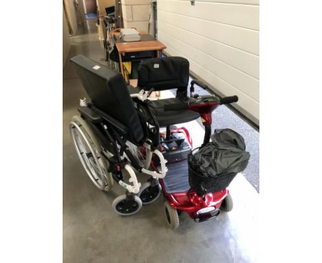 An Ultra lite 480 electric mobility scooter A/F and folding wheel chair