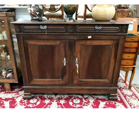 A teak 2 door 2 drawer buffet