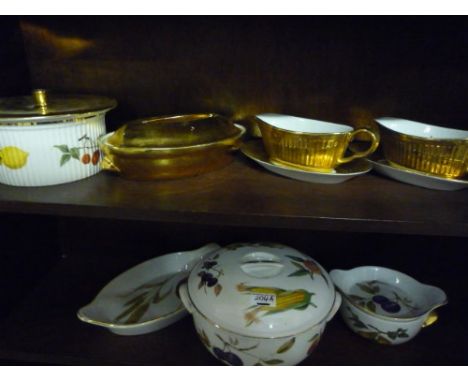 A Small Collection of Royal Worcester Evesham & Gilt Decorated Dinnerwares (2 shelves).