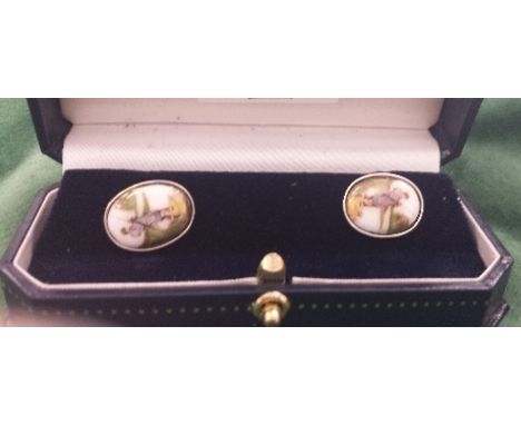 A Pair of Silver Enamel Fisherman's Cufflinks.